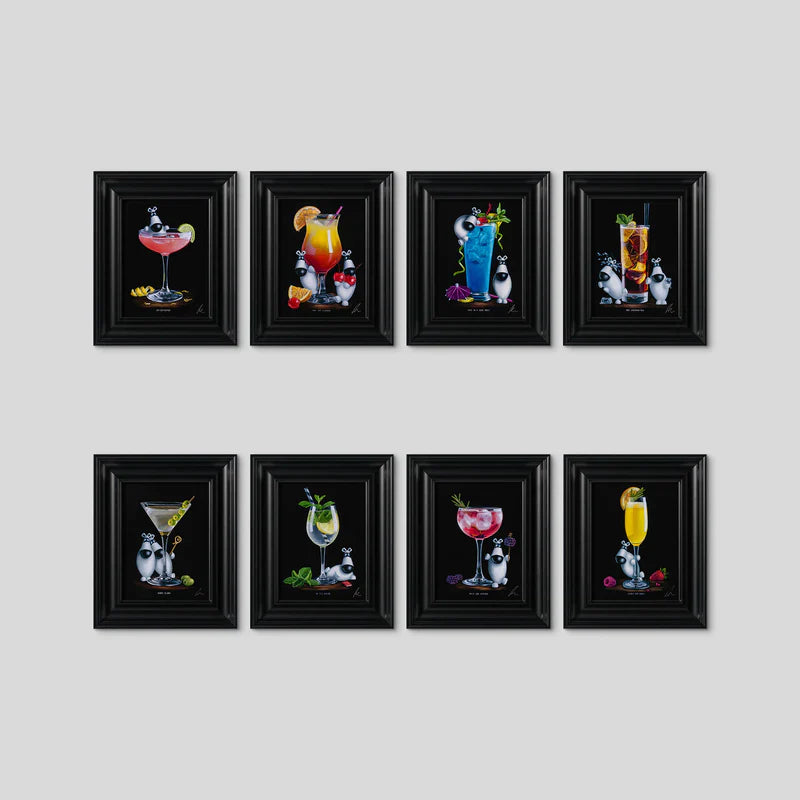 Set of 8 framed wall art prints featuring colorful cocktail illustrations with whimsical characters