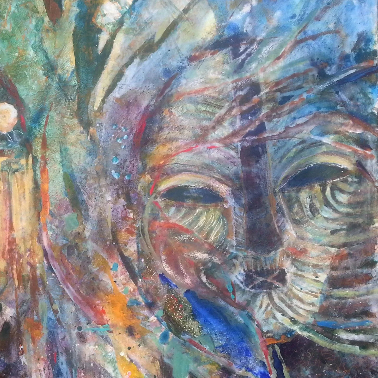 Abstract colorful painting with large cat face and swirling Mardi Gras-inspired brushstrokes