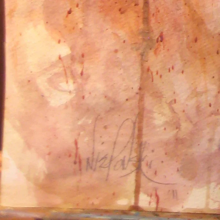 Close-up of artist signature on abstract watercolor painting with brown and beige hues.